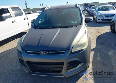 2014 Ford Escape Titanium z USA, uszkodzony, nr VIN 1FMCU0J99EUB62087